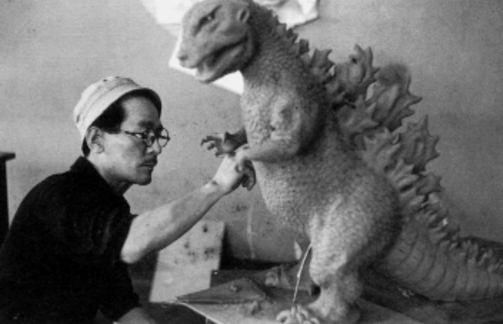 Teizô Toshimitsu sculpting an early Godzilla design, circa 1954.